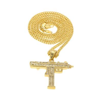 China Cool Hiphop Hiphop Gold Plated Micro Cobblestone Gun Pendant For Men for sale