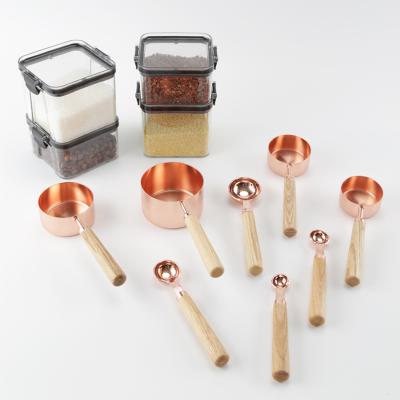 China Sustainable High Quality Stainless Steel Measuring Cups Spoons With Wooden Handle for sale