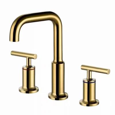 China Luxury Gold Metered Faucets Brushed 3 Holes Double Handle Wash Basin Faucet Water Mixers for sale