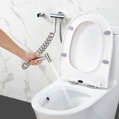 China Minimalist Bidet Sprayer Good Quality Bathroom Bidet Spray One Tap 2 Plug Functons Wall Mount Toilet Bidet Sprayer Brass Set for sale