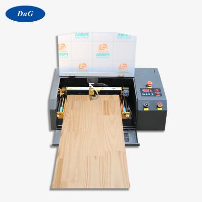 China Mini 3020 Small 40w 50w Smart CO2 Laser Engraver Bamboo Leather Cutting Machine Smart Glass Granite Stone Portable Acrylic Wood Paper for sale