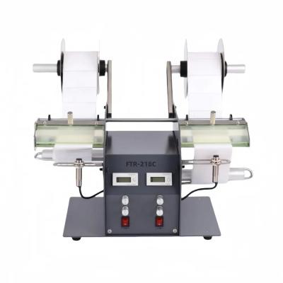 China Semi Automatic Label Dispenser Machine Double Head Transparent Label Separator for sale