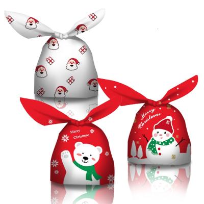 China 50 Pcs Recyclable Holiday Christmas Treat Bags Plastic Candy Gift Bag Drawstring Gift Bag Christmas Kids Chocolate Bags for sale