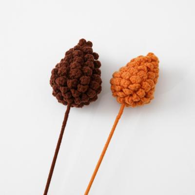 China Decoration or new crochet wool pendant flowers headed pine fruit finished flower branch simulation bouquet material raw wood color for sale