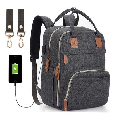 China Custom Multifunctional Backpack USB Port Mom Diaper Bag Baby Backpack For Mothers for sale