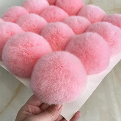 China Auto Fur Skin Rabbit Upholstery Rabbit Fur Material Soft Pompom Ball for sale