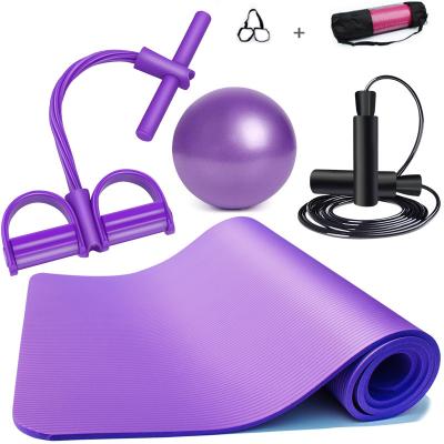 China Durable 10mm yoga mat four-piece two-strand slimming tension rope pedal kicker pilates ball yoga mat fitness equipment set jumping for sale