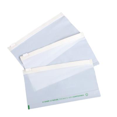 China Coustom Compostable Biodegradable Logo Size Frosted Zipper Bag Thickened Clothing Packing Environmental Protection Bone Biodegradable Bags for sale