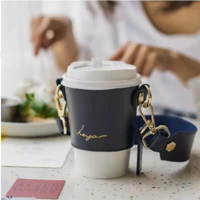 China Beverage CoffeeCup Portable Chain PU Reusable Leather Coffee Cup Holder With Handle for sale