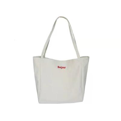 China Large Capacity Washed Canvas Bag Letter Embroidery Shoulder Shopping Bag Large Capacity Eco-friendly Bag for sale