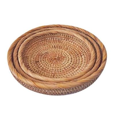 China Sustainable Table Woven Basket Rattan Bread Food Fruit Round Wicker Serving Tray for sale