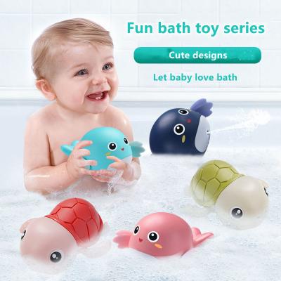 China Sand Playing Tool Cartoon Dolphin Design Baby Bath Toy Children Bath Toy Swimming Baby Bath Toy for sale