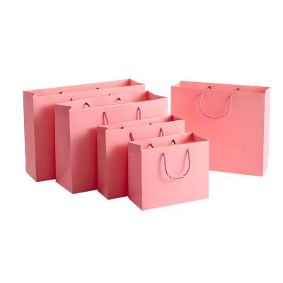 China Handmade Printed Your Own Logo Packaging Makeup Products Shopping Pink Paper Bag for sale