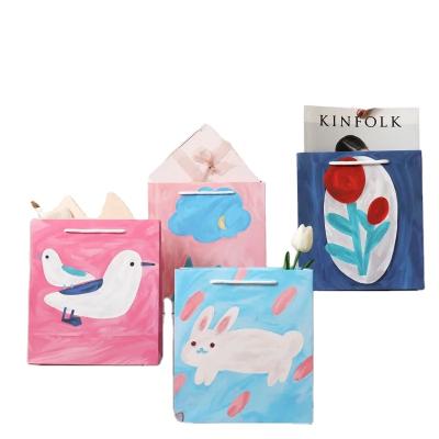 China Recyclable creative series high-grade oil painting gift birthday clothing thickened paper bags customized for sale