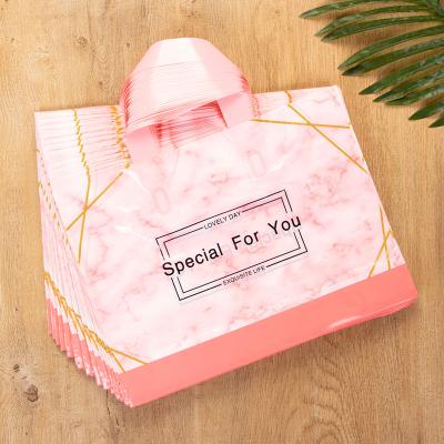 China Wholesale soft loop moisture proof handle luxury plastic die cut clothing shoe boutique shopping bags with logos with handles for sale