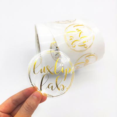 China Waterproof Custom Printing Self-adhesive Self-adhesive Private Label Logo Foil Clear Sticker Roll Transparent Labels Gold for sale