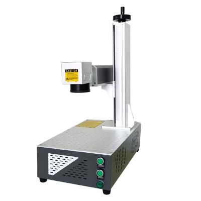 China Laser Marking Mini 20w Desktop Fiber Laser Integrated Marking Engraving Machine For Metal for sale