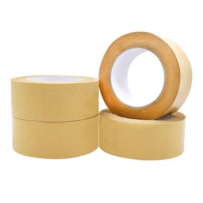 China Waterproof Easy To Tear Cross Cut Brown Round Printed Shape Kraft Paper Wrapping Tape Roll for sale