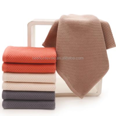 China China 100% Honeycomb Cotton Waffle Jacquard Compressed Face Hand Towel for sale