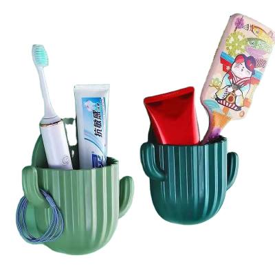 China Modern Bathroom Storage Box Toothpaste Bucket Wall Hanging Cactus Storage Rack for sale