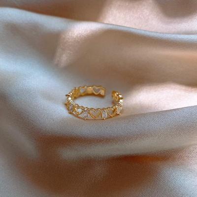 China TRENDY 2022 Women Jewelry Gold Plated Cuff Ring Simple Hollow Heart Heart Finger Ring for sale