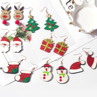 China FASHIONABLE Cartoon Metal Christmas Earrings Santa Christmas Tree Christmas Hat Snowman Elk Boots Gift for sale