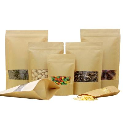 China Biodegradable Wholesale Kraft Paper Zip Lock Seal Bag Stand Up Pouch With Window for sale