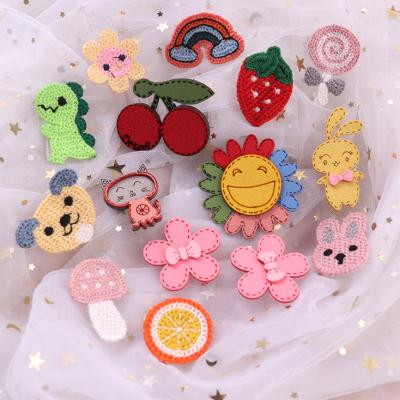 China Yifan High Quality Cheap Custom Handmade Adhesive Pattern Flower Cartoon Embroidery Magic Sticker Badge Patch for sale