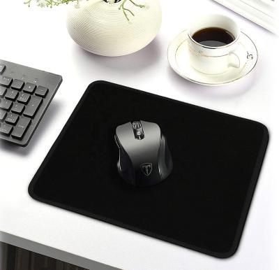 China Non-slip waterproof coated natural rubber gaming mouse pad with stitched edges and non-slip rubber base for sale