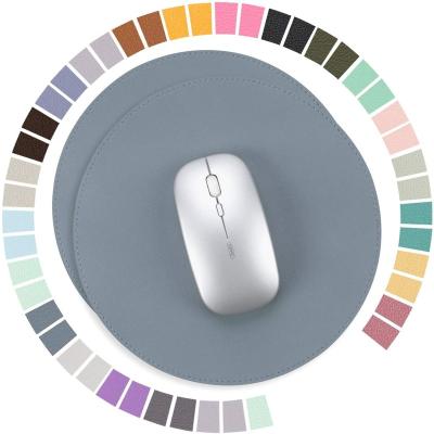 China Promotional Multifunctional Waterproof Deskpad Office Computer Gifts Matte High Quality Round Mouse Leather Desk Pads for sale