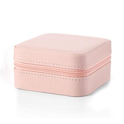 China Small Leather Jewelry Organizer Box Portable Mini Jewelry Travel Case with Zipper Mirror for Rings Necklaces Bracelets Earring for sale