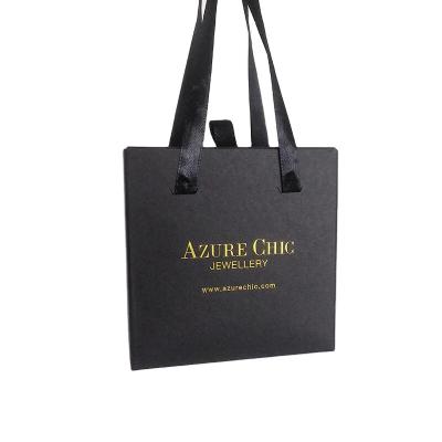 China High Quality Recycled Materials Guangzhou NOYO Black Paper Shopping Bag With Logo for sale