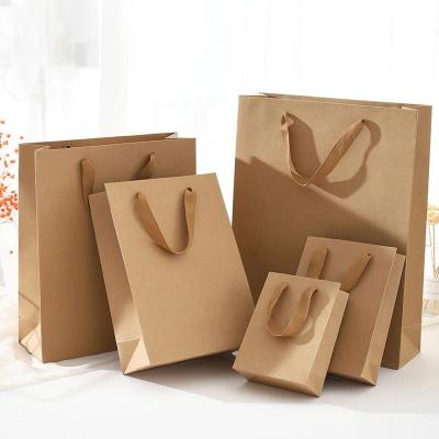 China New Recycled Materials Brown Gift Bags With Handles Multifunctional Kraft Paper Bags High-end Part Supplies Environmental Protection Recyclable Bag for sale