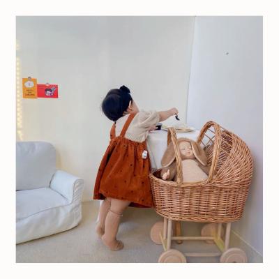 China New INS Kids Rattan Basket Sustainable Baby Trolley Wicker Picnic Baskets With Wheels For Kids Wicker Baskets for sale