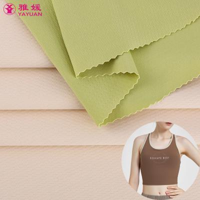 China Spandex 4 Double Faced Jacquard Stitch Pattern Nylon Spandex 33 Stretch 67 Way Nylon Weft Knitting Fabric for sale