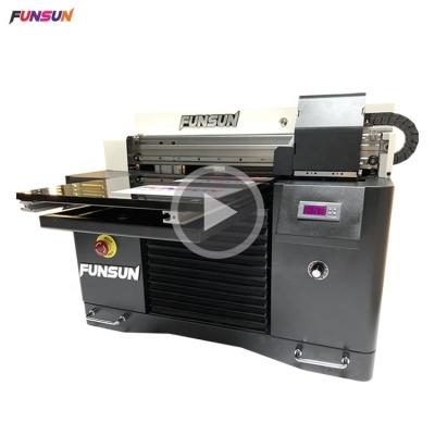 China Garment Shops 1440dpi A3 Flatbed UV Printer With CMYK And White Printing Phone Case Printer for sale