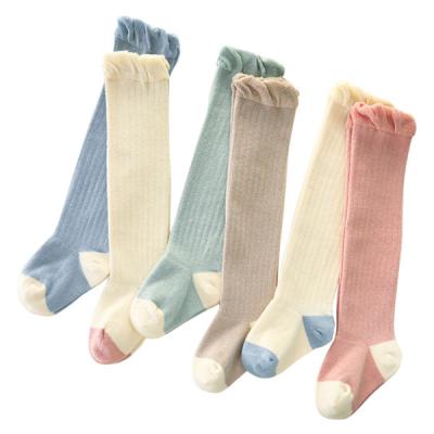 China OEM Solid Color Baby Sock Cotton Non Slip Warm Cute Baby Breathable Custom Knitted Tight Sock For Kids for sale