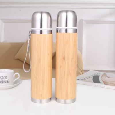 China PORTABLE Customize Bullet Shape Stainless Steel Bamboo Thermal Water Bottles With String Portable for sale