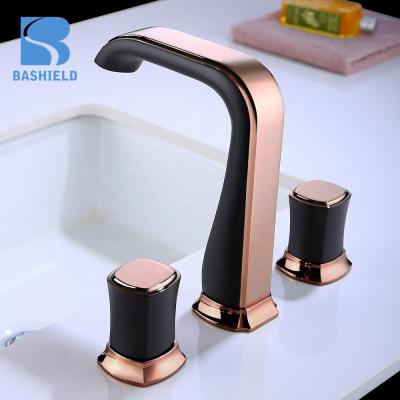 China Metered Faucets Basin Faucet Gold Black Color Two Handles Wash Basin Faucet for sale