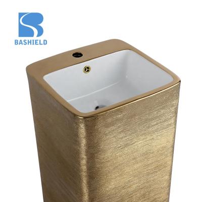 China Artistic New Modern Design Porcelain Gold Plated Wash Basin for sale