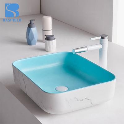 China Modern Ceramic Cheap Supply Wash Bathroom Countertop Decorative Sink Basin for sale