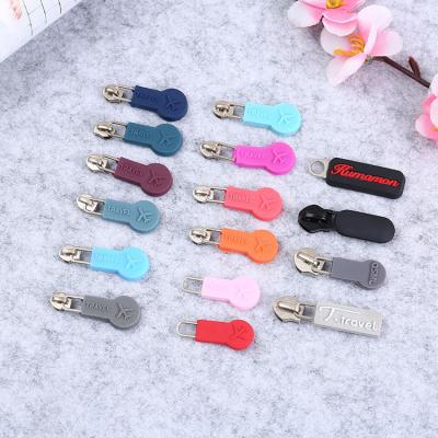 China Other OEM Premium Custom Zipper Pulls 3D Embossed Brand Logo PVC Soft Silicone Zipper Pullers For Clothing And Handbags for sale