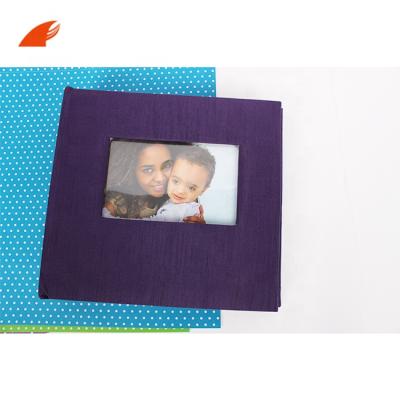 China Purple Cloth Color 12X12 Slip Baby Photo Album Handmade Paper Srapbook With Hard Cover for sale