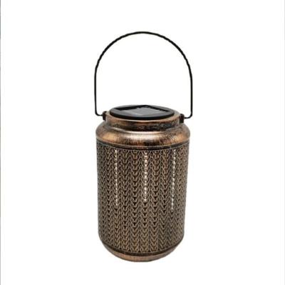 China Solar Wrought Garden Iron Aurora Projection Lantern LED Landscape Cavity Projection Light for sale