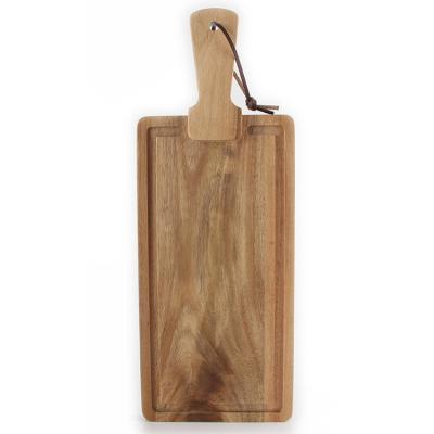 China Sustainable Size Custom Acacia Wood Cutting Board With Handle for sale