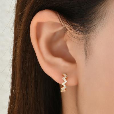 China TRENDY 18K Gold Plated Cubic Brass Circle Huggie Earrings Elegant Circle Wave Zircon Jewelry For Women Girl for sale