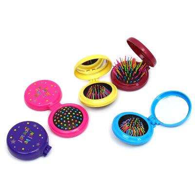 China Beautiful Pocket Compact Professional Plastic Hair Brush for Woman and Girls Pop Folding Mirror Comb Brush for sale