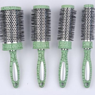 China Compact Plastic Round Ceramic Cylinder Rolling Brush Paddle Magic Hair Brush Professional for sale