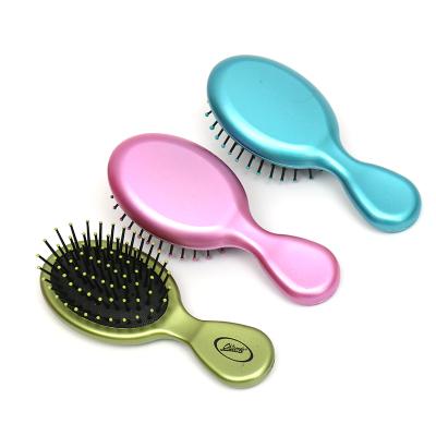 China Lovely child's hairbrush mini hair brush professional compact plastic children's cartoon hair child comb for sale