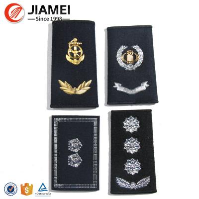 China Custom Military Army Garment Uniform Patch Badge Shoulder Lush Epaulets Police Embossed Metal Felt Embroidery Badges Free Custom for sale